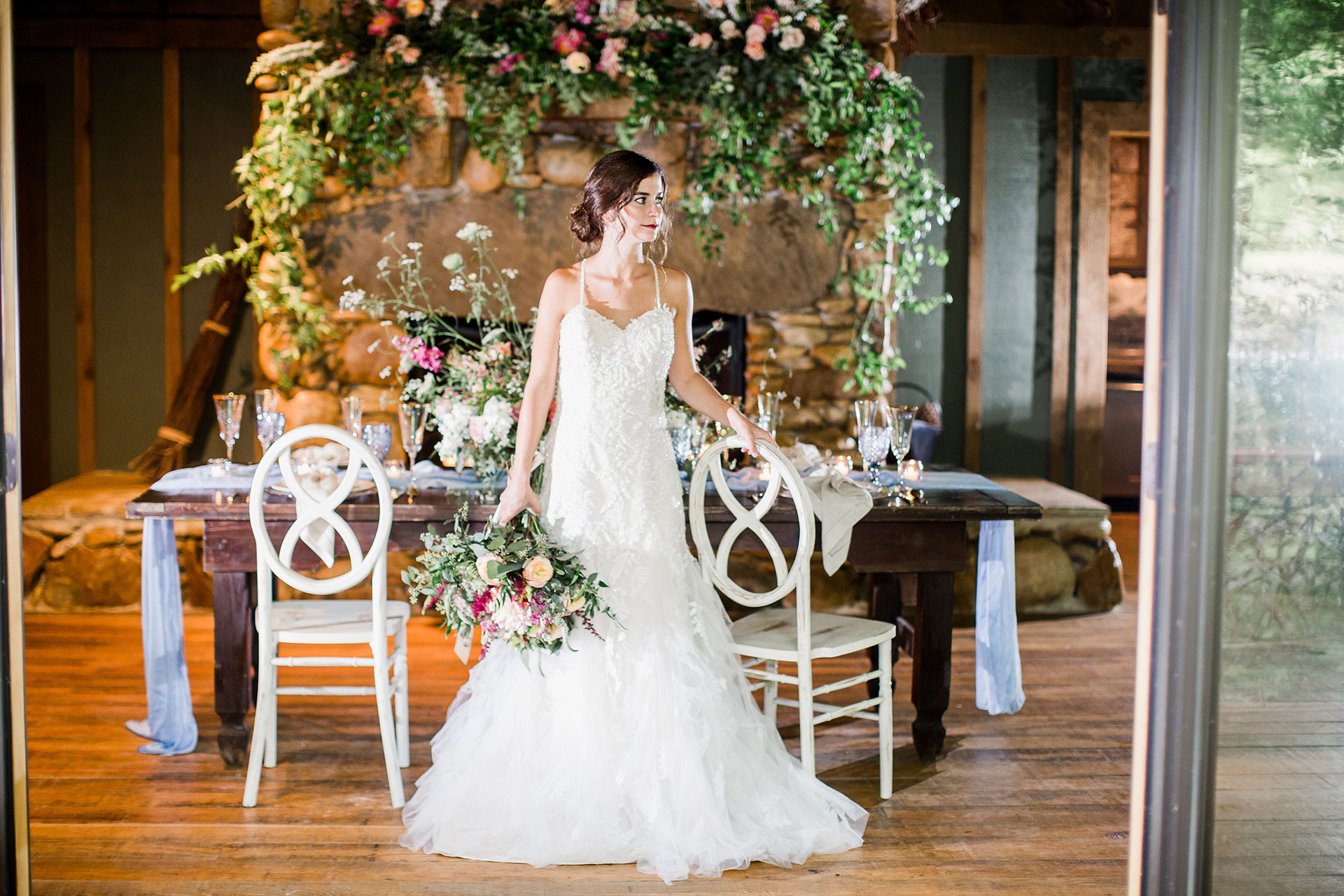 Bride in an intimate styled tablescape setting at Treehouse Grove